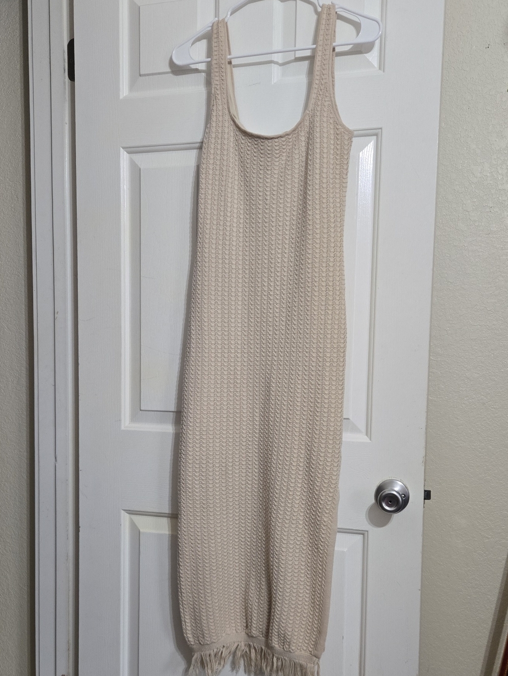 Sleeveless Cream Knit Maxi Dress with Fringe Hem